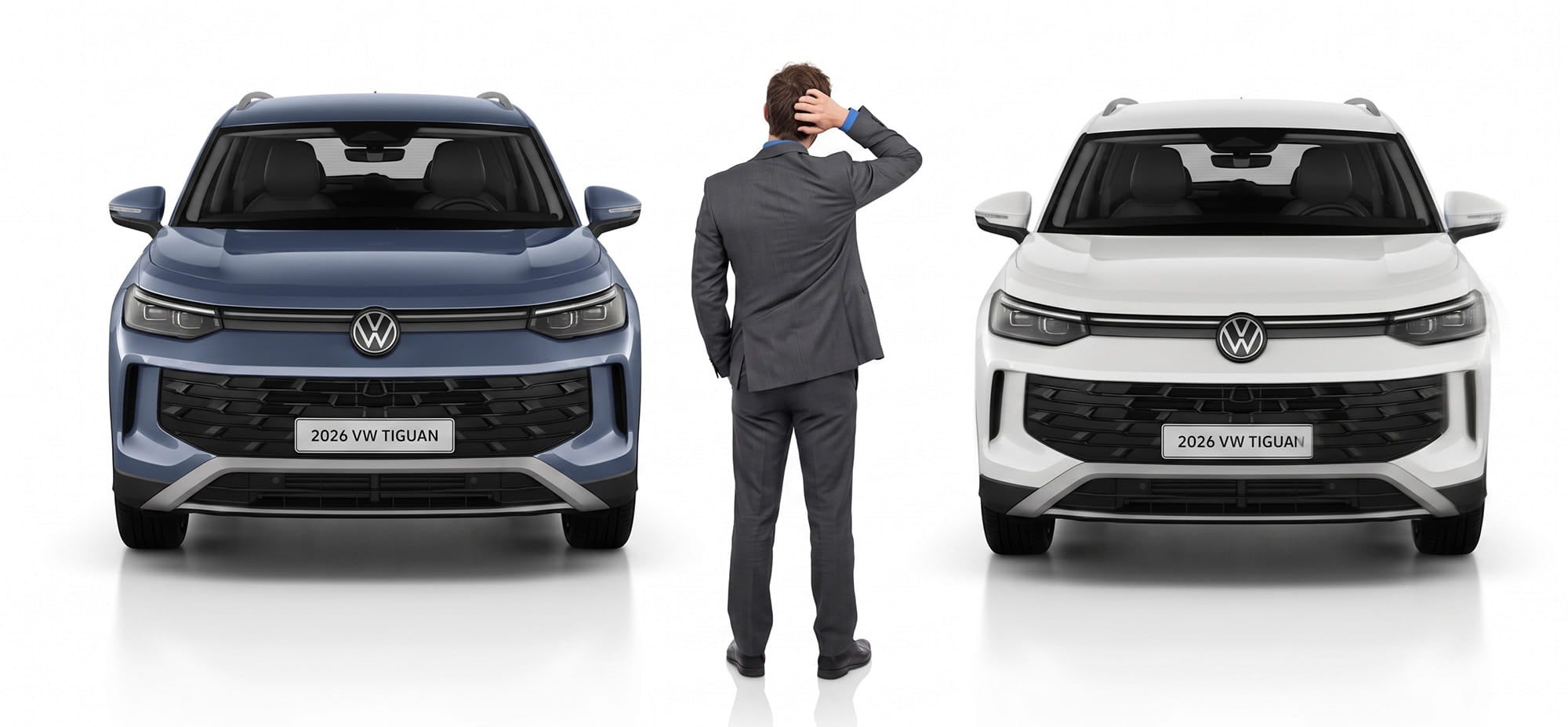 A driver comparing two Volkswagen models at Mike Savoie Volkswagen in Troy, MI
